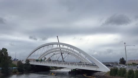Twin-Arch-Bridge-at-the-Kingsford-Smith-Sydney-International-Airport-Drive-on-a-cloudy-day-at-Tempe-Wolli-Creek,-NSW,-Australia