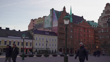 People-Walking-At-Downtown-Square-Of-Malmo-In-Sweden