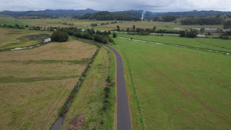 Clothiers-Creek-Road-Through-Fields-In-Tanglewood,-New-South-Wales,-Australia