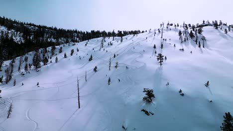 Aerial-view-of-ski-tracks-on-mountain-in-Desolation-Wilderness,-Lake-Tahoe,-California