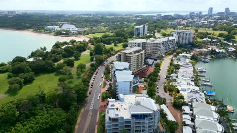 Aerial-Drone-of-Cullen-Bay-and-Marina-With-Cars-Driving-Along-Road-in-Darwin-NT-Australia