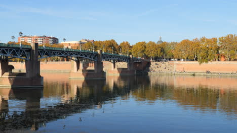 Saint-Pierre-of-Toulouse-bridge-over-Garonne-river-in-sunny-autumn-day,-France