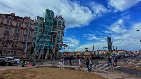 Tourists-Taking-Pictures-Of-Dancing-House,-Ginger-and-Fred-Building-In-Prague,-Czech-Republic