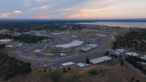 Aerial-Drone-View-of-Folsom-Prison-and-Folsom-Lake-during-sunset