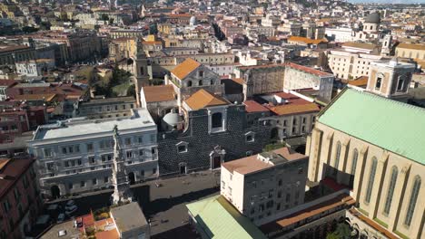 Forward-Drone-Shot-Above-Church-of-Gesu-Nuovo-in-Napoli,-Italy-on-Typical-Day