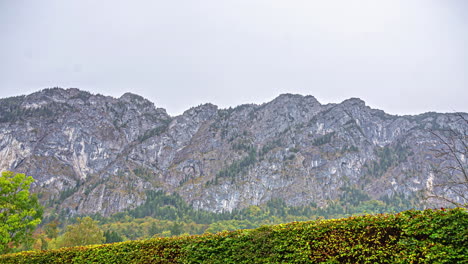 Rocky-Austria-alps-with-light-fog,-time-lapse-view