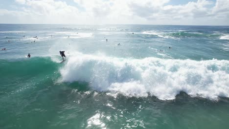 Surfers-Over-Huge-Sea-Waves-In-Cabarita-Beach,-New-South-Wales,-Australia