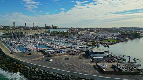 King-Harbor-Yacht-Club-in-California,-aerial-drone-orbit-view