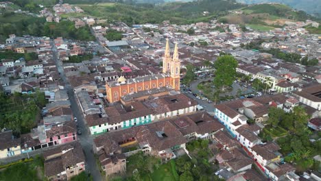 Aerial-view-of-the-church-and-central-park-of-the-andean-town-of-Marsella-in-the-department-of-Risaralda-in-the-Colombian-Coffee-Triangle