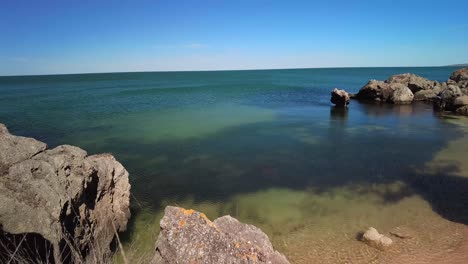 captures-the-tranquility-from-atop-cliffs,-offering-a-serene-view-of-the-Azov-Sea