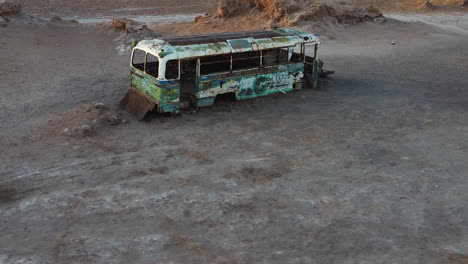 Graffiti-covers-abandoned-Magic-Bus-in-Chile-desert-altiplano,-tourism
