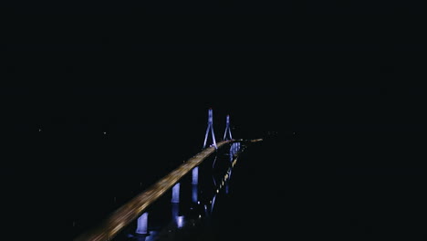 Puente-Atirantado-Vacío-Por-La-Noche,-Vista-Aérea-De-Drones,-Luz-Azul-Iluminada