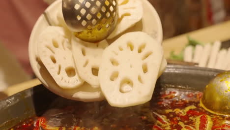 Close-up-Traditional-Chinese-Spicy-Hot-Pot-Style-With-A-Brass-Pot