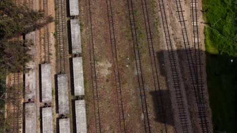 From-above,-we-capture-the-intricate-network-of-tracks-snaking-their-way-through-the-urban-landscape,-a-testament-to-Colombia's-railway-history