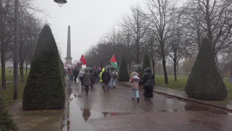 A-pro-Palestine-rally-going-through-Glasgow-Green-in-the-rain