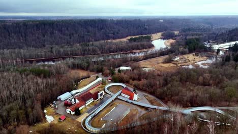 Geometrical-Way-at-countryside-autumnal-village-in-north-east-europe-aerial-drone-establishing-shot