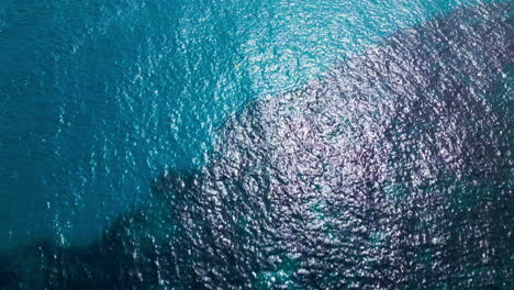 Aerial-view-of-rocky-coastline-and-crystal-clear-waters-in-Mallorca