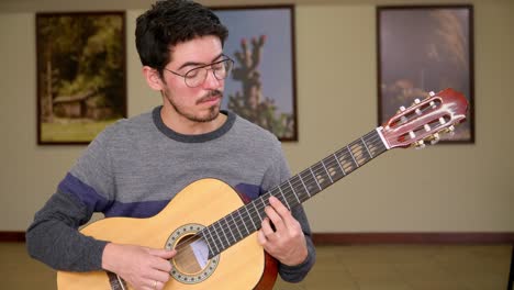 Guitarist-performing-on-a-classical-guitar