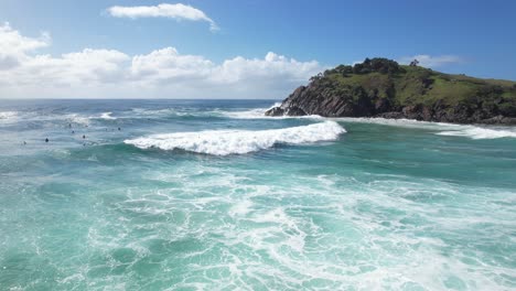 Surfers-At-Cabarita-Beach-In-New-South-Wales,-Australia---Aerial-Drone-Shot