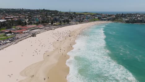 Aerial-drone-shot-of-Bondi-Beach,-one-of-Australia's-most-iconic-coastal-destinations