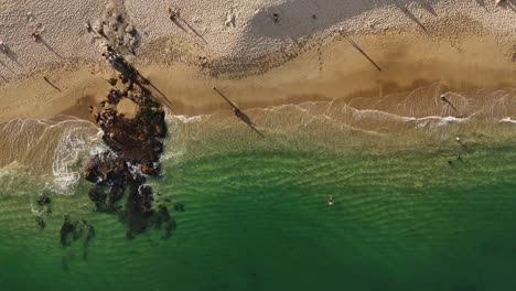 Drone-footage-showcasing-scenic-Chahue-Bay-and-its-sandy-coastline-in-Huatulco,-Mexico