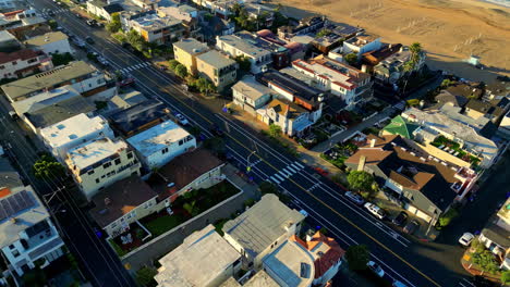 Manhattan-Beach,-California,-USA---Automobiles-Traversing-the-Roadway-Close-to-the-Beach---Aerial-Drone-Shot