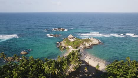 Exotic-paradise-in-Colombia,-from-above-coast-of-National-Park-Tayrona,-parallax