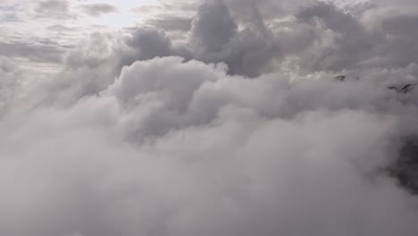 Aerial-view-of-Segla-mountain-above-the-sky,-Norway-during-summer