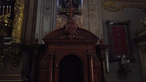 Confessionary-wooden-religious-room-for-speaking,-christian-sins-at-basilica-san-jose-de-flores-buenos-aires-argentina,-dark-cross-eclectic-architecture