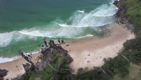 Norries-Beach-And-Norries-Cove-With-Beachgoers-In-Bogangar,-NSW,-Australia