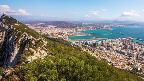 Timelapse-on-top-of-the-hill,-high-elevation-landmark-view-of-Gibraltar,-Spain