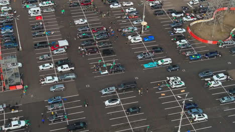 Fans-boycott-the-Oakland-A's-and-tailgate-in-the-parking-lot---aerial-orbit