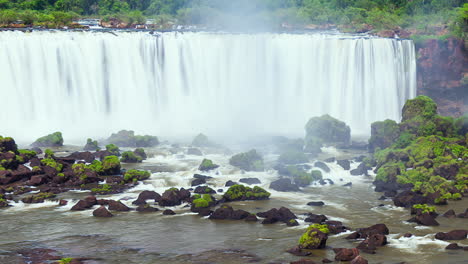Timelapse-of-Waterfalls-of-Iguazu-around-a-big-green-area,-in-a-sunny-day,-Foz-do-Iguacu,-Parana,-Brazil