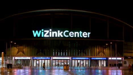Wide-angle-shot-of-the-WiZink-Center,-Madrid's-indoor-sports,-trade,-and-music-event-arena,-during-nighttime