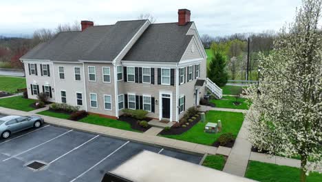 UPS-United-Parcel-Service-Delivery-Truck-in-quaint-american-neighborhood-during-cloudy-day