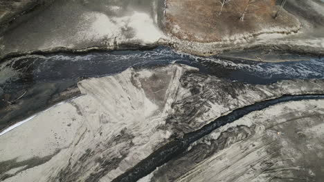 Aerial-descend-on-the-conversion-of-two-stream-channels-in-dried-reservoir-pond