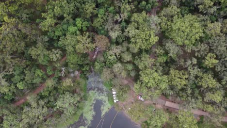 4K-Drone-shot-of-a-recreational-area-at-a-lake-with-safe-swimming-with-a-safety-net