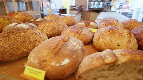 Freshly-baked-artisan-bread-on-display-in-bakery