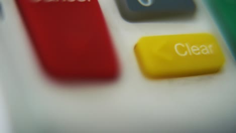 A-macro-close-up-shot-of-a-pin-pad-numbers-and-letters-on-colorful-buttons,-smooth-tilt-down-movement,-Full-HD-video,-super-slow-motion,-blurry-depth-of-field,-cancel-clear