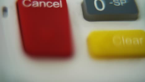 A-macro-close-up-shot-of-a-pin-pad-numbers-and-letters-on-colorful-buttons,-smooth-tilt-up-movement,-Full-HD,-super-slow-motion,-blurry-depth-of-field