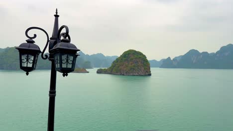 Old-fashioned-lamps-on-cruise-ship-cruising-through-the-limestone-karsts-of-Ha-Long-Bay-and-Lan-Hay-Bay-area-in-Vietnam