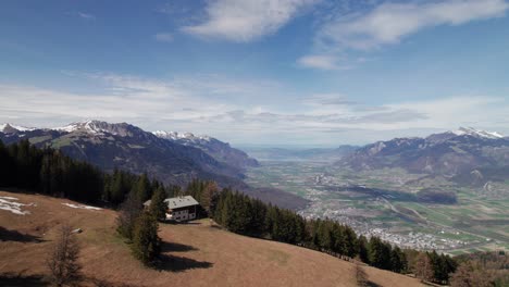 Gorgeous-Alpine-Chalet-looking-down-on-Valais,-Monthey,-Switzerland