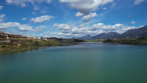 Serene-Waters-of-Farka-Lake-Reflecting-the-Construction-of-Luxurious-Housing-Complexes-on-the-Outskirts-of-Tirana's-Capital