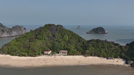 A-cinematic-drone-video-showing-islands-and-boats-anchored-close-to-Money-Island-in-Lan-Ha-Bay