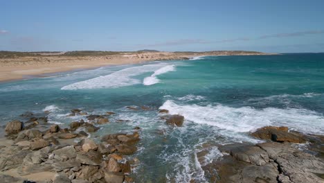 Beautiful-surf-bay-Greenly-Beach-with-breaking-waves-and-teal-ocean-color,-Eyre-Peninsula,-South-Australia