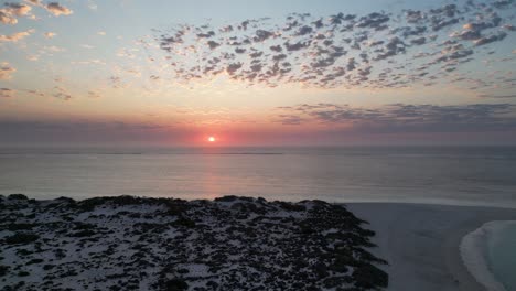 Australian-bay-with-setting-sun-over-sea