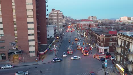 Firetrucks-On-Street-In-Response-To-Fire-Incident-At-Apartment-Building-In-Montreal,-Canada