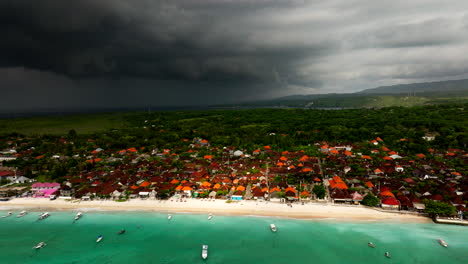 Dark-Storm-Clouds-Over-Seaside-Town-Of-Nusa-Lembongan-Island-In-Bali,-Indonesia