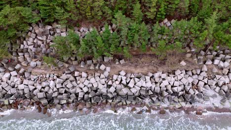 Top-View-Of-Stone-Blocks-Sea-Walls-In-Uzava,-Baltic-Sea,-Latvia