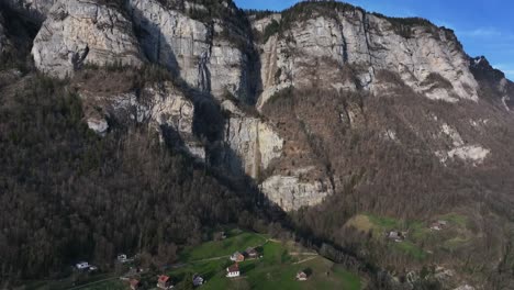 Seerenbach-Falls-tumbling-down-to-Walensee,-aerial-view
